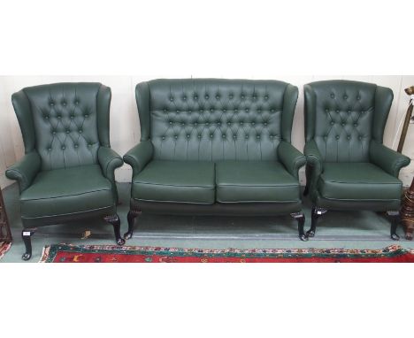 A green vinyl high back Chesterfield sofa with matching armchairs (3) Condition Report: Available upon request