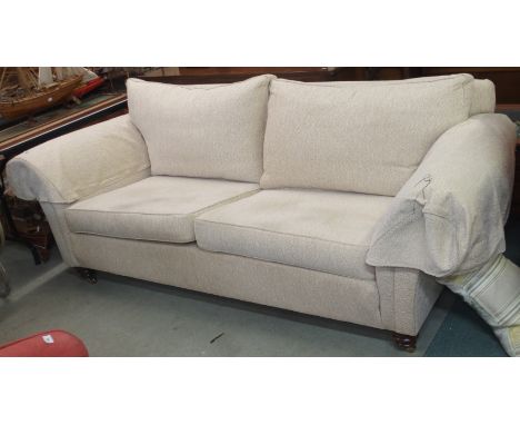 A three seater sofa Condition Report: Available upon request