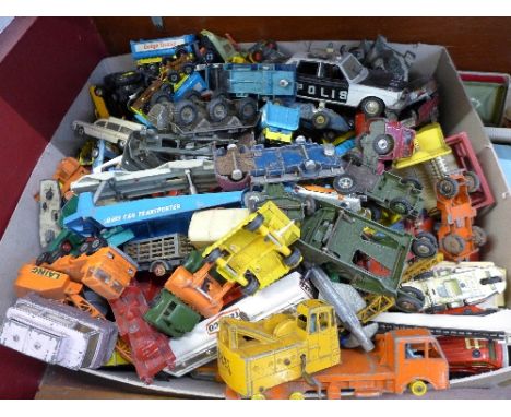 A box of playworn die-cast vehicles including Dinky, Budgie, Corgi, etc.