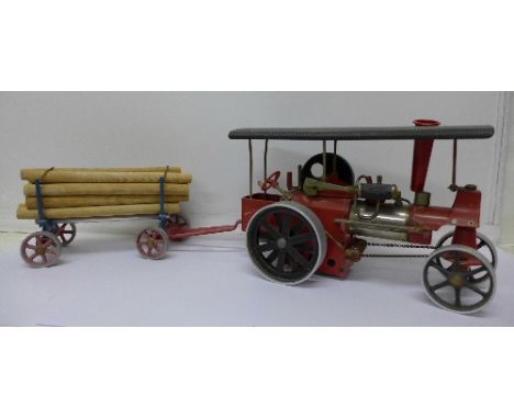A Wilesco steam traction engine with trailer