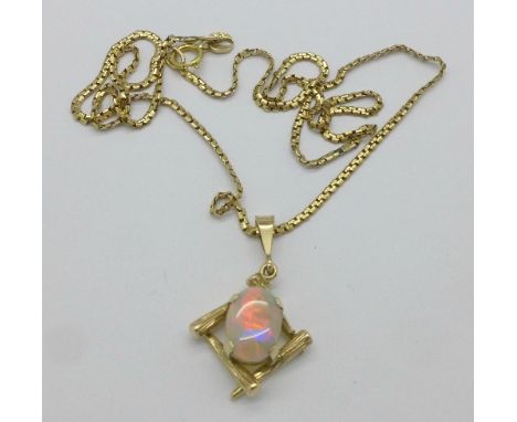 A 9ct gold mounted synthetic opal on a 9ct gold chain, 5.9g