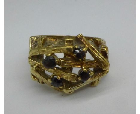 A 9ct gold and garnet ring, 6.8g, M