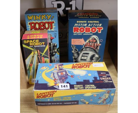 A Rocket USA tinplate R-1 battery-operated robot (bare metal) and four other modern robots, comprising a Planet Robot mechani