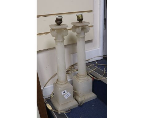 A pair of alabaster lamp bases