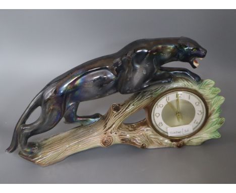 A French ceramic panther mantel timepiece height 23cm