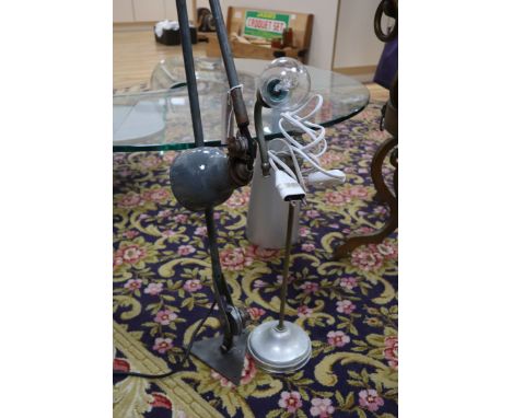 An angle poise lamp and another