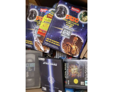 A collection of vintage Star Wars VHS tapes, DVDs, PC/console games etc. see Gorringes website condition report for details o
