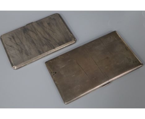 Two engine turned silver cigarette cases, largest 15.2cm.