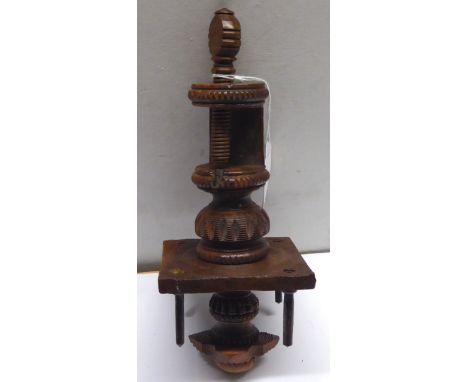 A Lignum Vitae Bobbin Stand. 