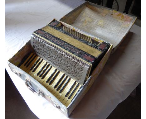 A Carlo Carsini Piano Accordion in case.