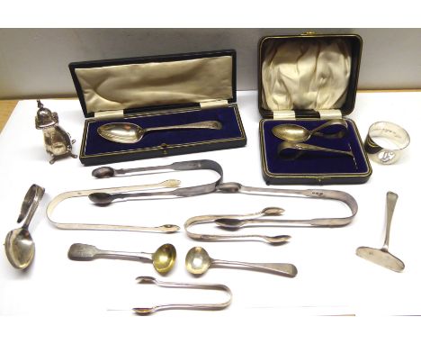 Five pairs of silver Sugar Tongs, two silver mustard spoons, silver serviette ring, pepperette and other items.  (10.4ozs)