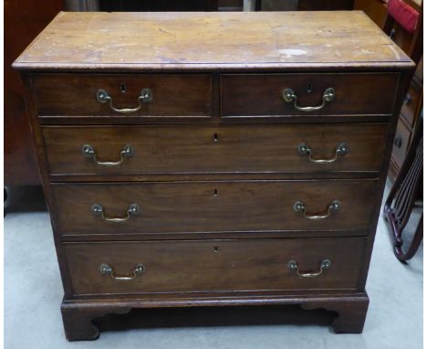 A George III mahogany Chest of three long and two short graduated Drawers on bracket feet.  3' (92cms) wide. 