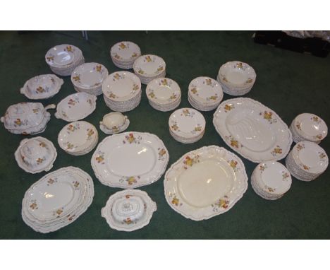 An extensive late Victorian/Edwardian Dinner Service by Booths of Staffordshire with Royal semi-porcelain body, decorated wit