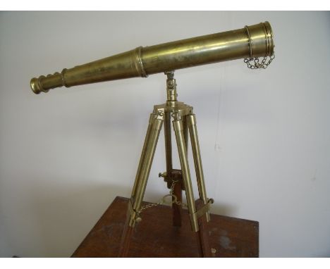 Pair of reproduction brass telescopic binoculars on tripod stand 