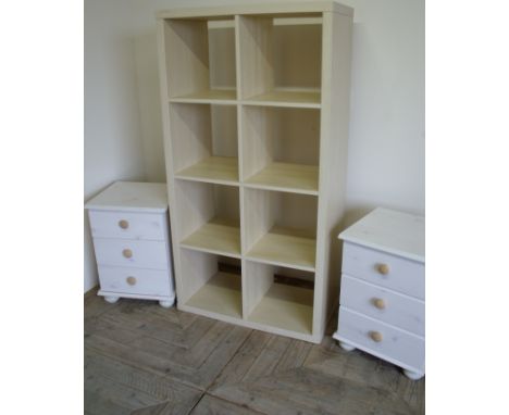 Pair of three drawer laminate bedside chests and a multi section beech laminate shelf unit (3)