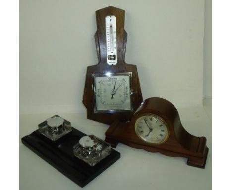 Oak cased barometer, mahogany cased mantel clock and 1930s desk stand with twin glass inkwells and pen tray 