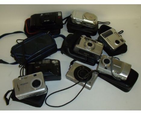 Selection of various digital cameras including Canon, Olympus, Pentax, Polaroid etc.