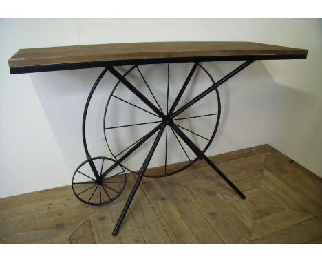 As new ex shop display hall table with solid wooden top on metal base in the form of a penny farthing bicycle (width 121cm x 