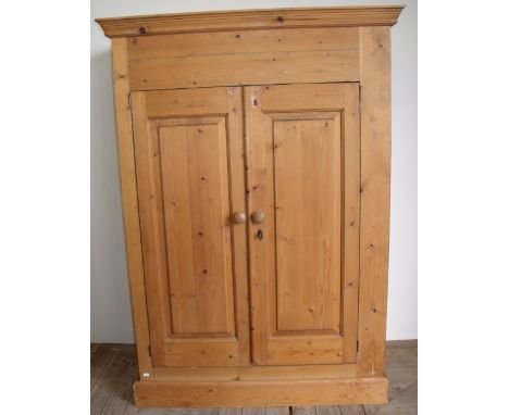Pine 2 door wardrobe of small proportions (113cm x 58cm x 161cm)