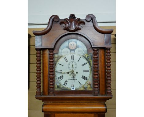 A VICTORIAN MAHOGANY LONGCASE CLOCK by S Bibby, Carnarvon, the painted arched dial set with Roman numerals, Arabic subsidiary