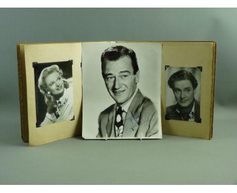 A PHILMAR SCRAP BOOK containing film star autograph collection, hand signed or printed including John Wayne, Mario Lanza, Ann