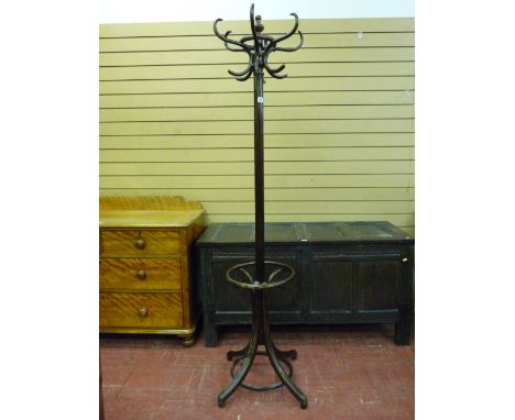 A VINTAGE POLISHED BENTWOOD COAT & HAT STAND with brolly keep, having original applied Fischel label, 186 cms high