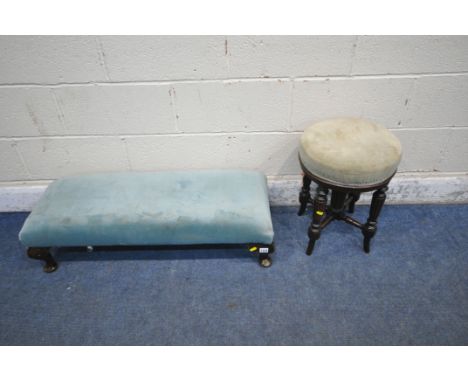 AN EARLY 20TH CENTURY FOOTSTOOL, with blue upholstery, raised on cabriole legs, length 94cm x depth 35cm x height 24cm, along