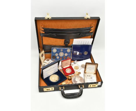 A COMBINATION BRIEFCASE CONTAINING AMOUNTS OF COIN MEDALS and COMMEMORATIVES, to include a proof Maundy Medallion to Commemor