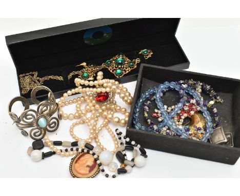 AN ASSORTMENT OF COSTUME JEWELLERY, to include imitation pearl necklaces, paste necklaces, brooch, cuff bangle, an amethyst b