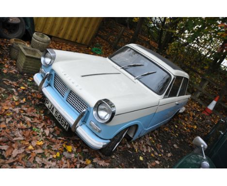 A 1970 TRIUMPH HERALD 1200 TWO DOOR SALOON CAR, in blue and white, with a 1147cc petrol engine, four speed manual gearbox, su