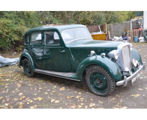 A 1948 ROVER P3-60 FOUR DOOR SALOON CAR IN GREEN, with a 1595cc petrol engine, four speed manual gearbox with freewheel contr