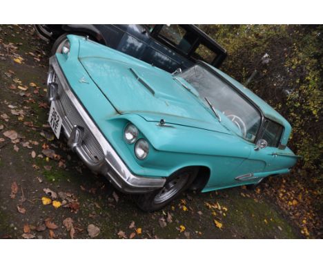 A 1959 FORD THUNDERBIRD TWO DOOR COUPE CAR, in turquoise and white with a 7038cc V8 petrol engine, column shift automatic gea