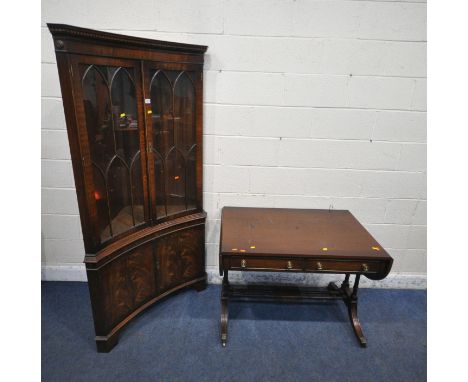 A BEVAN FUNNELL REPRODUX MAHOGANY CONCAVE CORNER CUPBOARD, with double glass doors, above double cupboard doors, width 92cm x