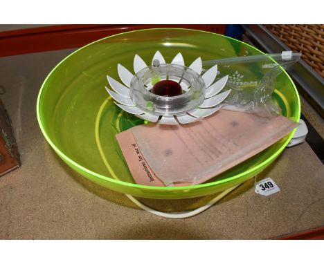 A VINTAGE MID-CENTURY INDOOR WATER FOUNTAIN with fluorescent green plastic bowl, and white lotus inspired centrepiece with a 