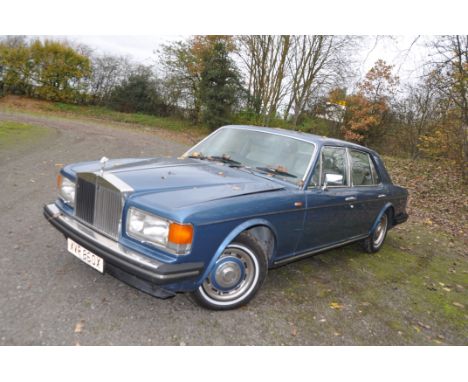 A 1982 ROLLS ROYCE SILVER SPIRIT FOUR DOOR SALOON CAR, in blue, with a 6750cc petrol engine, column shift automatic gearbox, 