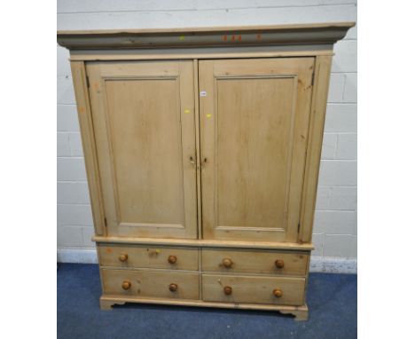 A 19TH CENTURY PINE HOUSEKEEPER'S CUPBOARD, with an overhanging cornice, the double doors enclosing later shelves and shelf r