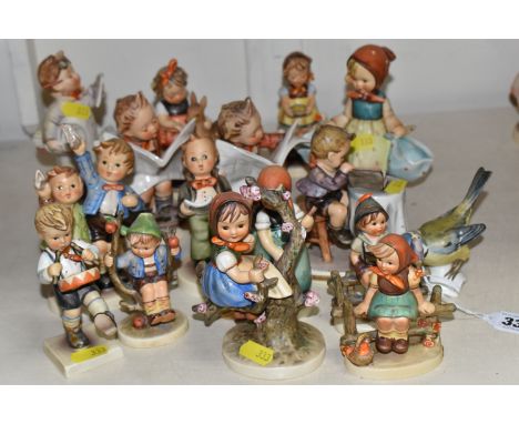 A GROUP OF SIXTEEN HUMMEL FIGURES BY W. GOEBEL to include 'Wayside Harmony' 111 3/0 (marks on the base), 'Just Riding' 112 3/
