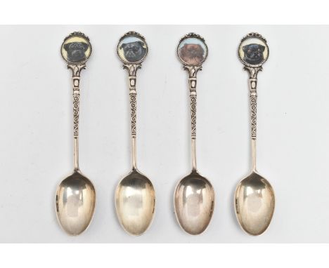 FOUR SILVER TEASPOONS, each with a painted round terminal depicting dogs, the scrolling stems and polished bowls, each hallma