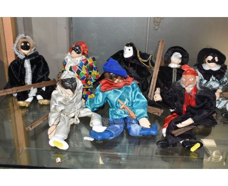 A GROUP OF EIGHT VINTAGE CONTINENTAL 'COMMEDIA DELL'ARTE' MARIONETTE PUPPETS comprising eight different characters from the I