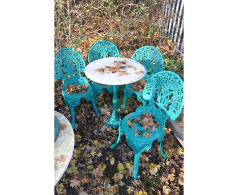 A SET FOUR OF MODERN CAST GARDEN CHAIRS, and a Victorian style cast iron pub table, with tripod base and white marble top, 59