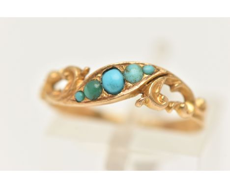 A YELLOW METAL TURQUOISE RING, set with a row of five small turquoise cabochons, to the scrolling shoulders and polished band