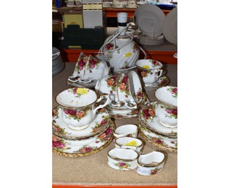 A COLLECTION OF ROYAL ALBERT 'OLD COUNTRY ROSES' TEAWARE, comprising seven cups, seven saucers, six tea plates, four napkin r