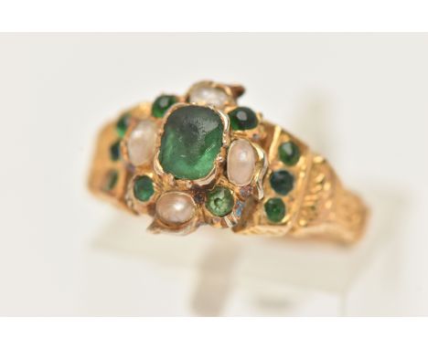 A YELLOW METAL GREEN PASTE AND SPLIT PEARL CLUSTER RING, to the scrolling shoulders and textured band, unmarked metal, ring s