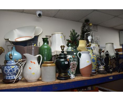 A LARGE QUANTITY OF LAMPS AMD DECORATIVE ORNAMENTS to include approximately fourteen lamps of assorted size and form to inclu