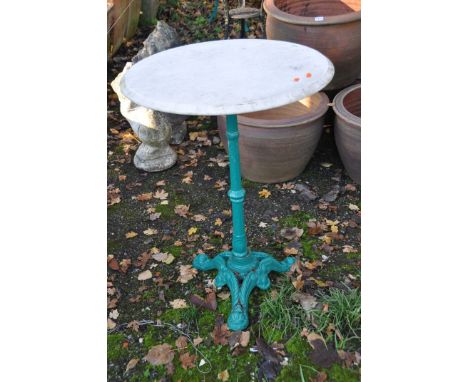 A VICTORIAN STYLE CAST IRON PUB TABLE, with tripod base and white marble top, 59cm in diameter and 79cm high, Condition Repor