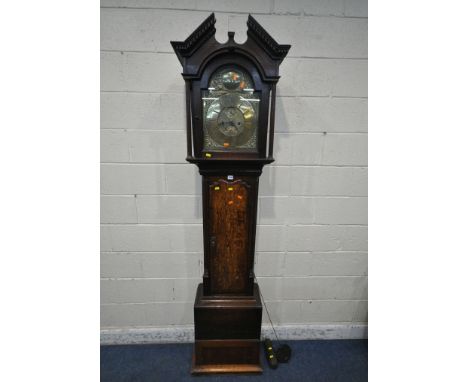 A GEORGIAN OAK EIGHT DAY LONGCASE CLOCK, with a broken arch pediment, Corinthian style pillar supports, flanking an arched gl