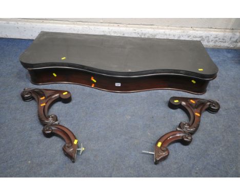 A VICTORIAN MAHOGANY WALL MOUNTED CONSOLE TABLE, with a slate top and a single drawer, and two scrolled supports (condition r