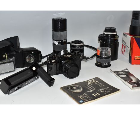 A BOX OF PHOTOGRAPHIC EQUIPMENT, to include a Canon A-1 camera fitted with a Canon f2.8 28mm lens, with instruction manual an