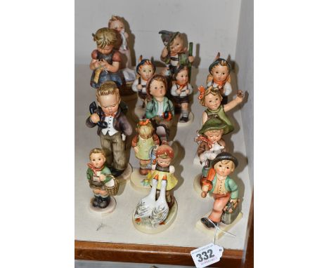 A GROUP OF FIFTEEN HUMMEL FIGURES BY W. GOEBEL to include 'Merry Wanderer' 112/09, 'Goose Girl' 473/0, 'Village Boy' 513/0, '