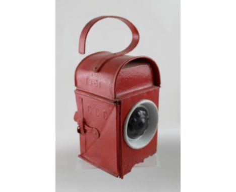 A Caernarfon County Council red road lamp, height 28cm.